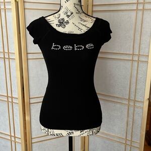 Authentic Bebe top with cap sleeves & crystals/ fits more like a small
